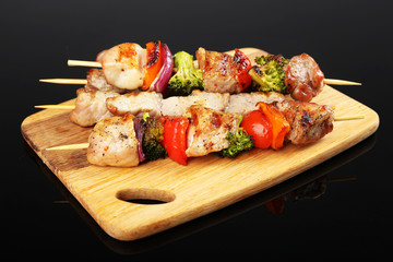 Pork kebab on black background