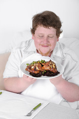 Tasty lunch for fat man, on home interior background