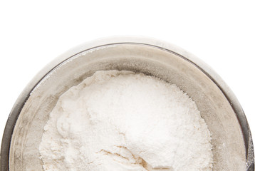 Flour in mixing steel mixing bowl.