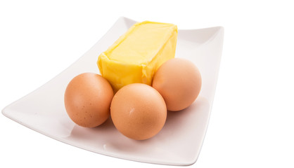 A group of chicken eggs and butter - 63792972