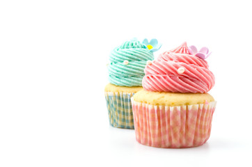 Vanilla cupcakes isolated white background