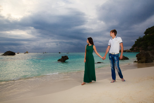 young loving couple on tropical beach