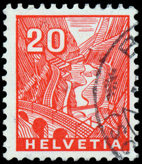 Stamp printed in Switzerland shows train track to Railway St Got