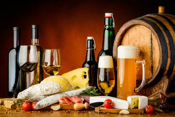 Gartenposter Still life with traditional food, beer and wine © draghicich