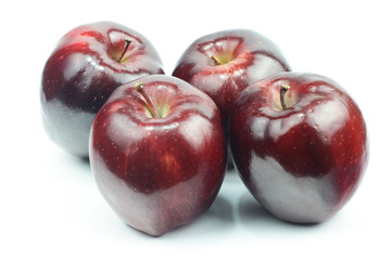 Red apples on white background