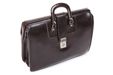 Old suitcase isolated on white background