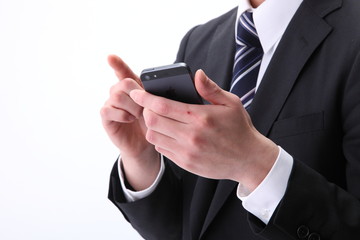 スマートフォンを持つビジネスマン