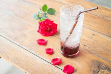 Serving pomegranate drink on wood table