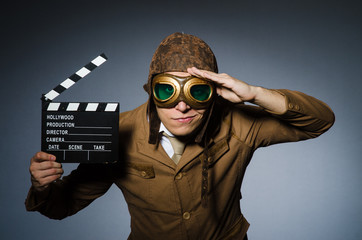 Funny pilot with goggles and helmet