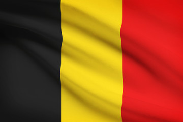 Naklejka premium Seria potarganych flag. Belgia.