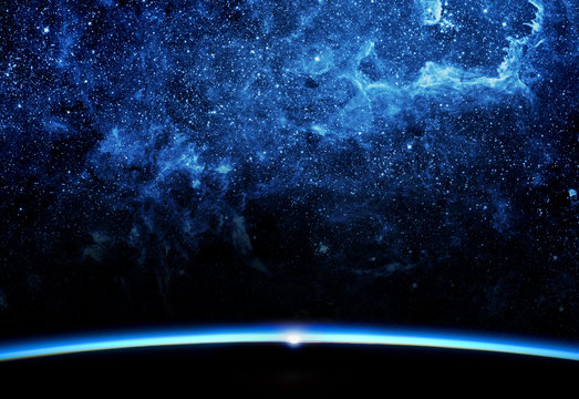 Earth and galaxy.