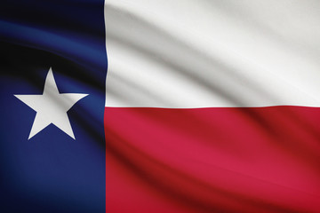 Fototapeta premium Series of ruffled flags. State of Texas.