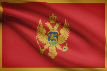 Series of ruffled flags. Montenegro.