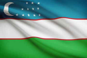 Series of ruffled flags. Republic of Uzbekistan.