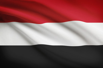 Series of ruffled flags. Republic of Yemen.