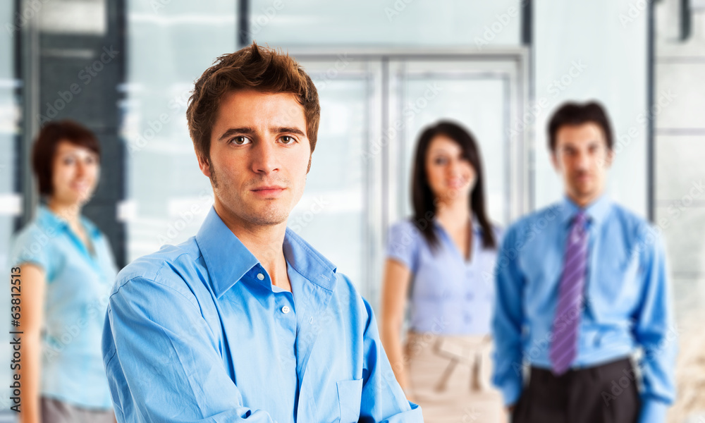 Canvas Prints Young man in front of a group of people