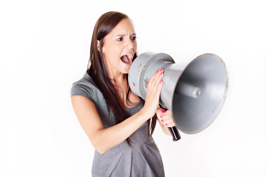 Businesswoman shouting on his megaphone
