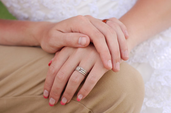 Bride and groom wedding rings