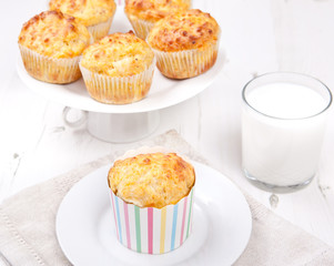 Savory cheese and bacon muffins on the white table