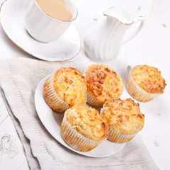 Savory cheese and bacon muffins on the white table
