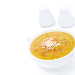 soup of yellow lentils with vegetables, isolated on white