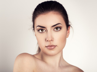 Skin facial care. Young attractive woman  posing in studio