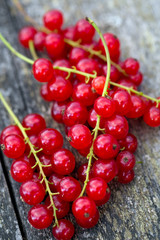 red currant on wooden background