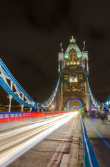 Fototapeta na wymiar Tower Bridge at night with moving light traces, London, Uk