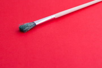 Paint brush an red  background