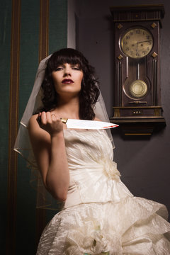 Bride with sharp knife