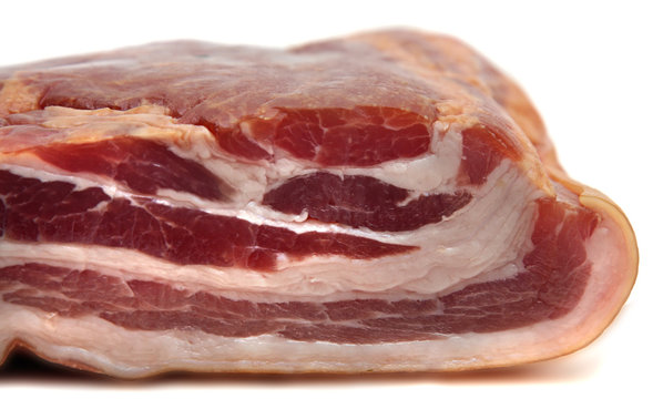 piece of meat smoked bacon isolated white background.