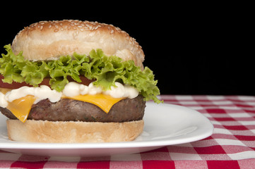 Homemade Hamburger on black background