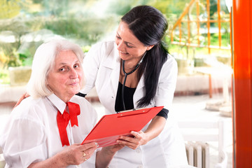 senior woman and nurse © suzanam