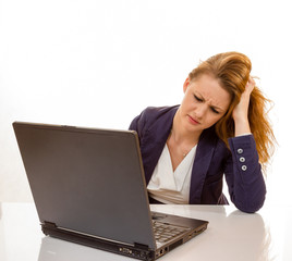 young woman is stressed due to computer failure - 63838950