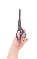 Black scissors in human hand.