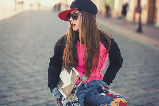 hipster young girl with skate board