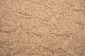 Crumpled packaging brown paper as background