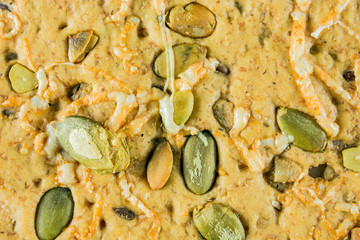 Crispy bread with seeds and melted cheese