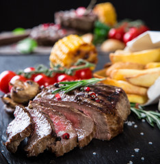 Beef steak on wooden table