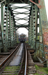 Fototapeta na wymiar old train on iron bridge