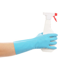 Hand in glove holding white plastic spray bottle.