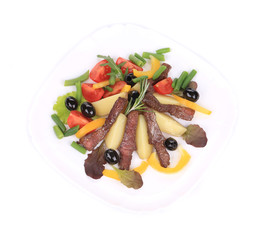 Salad with beef fillet and vegetables.