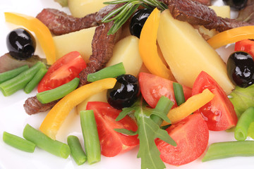 Salad with beef fillet and vegetables.