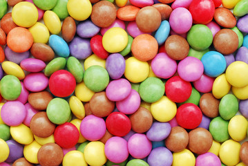 Fototapeta na wymiar kolorowe cukierki w tle