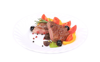 Grilled steak with fresh vegetables.