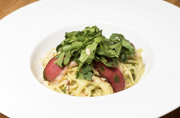 Pasta with tomato sauce and herbs