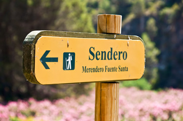 yellow billboard at countryside