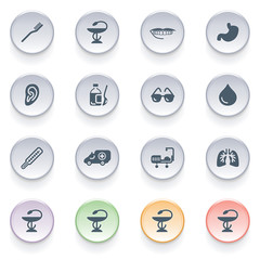 Medical icons on color buttons.