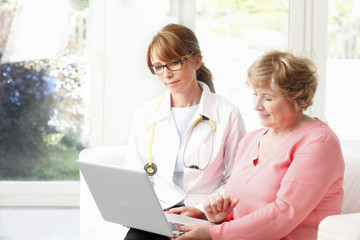 Female doctor with senior patient