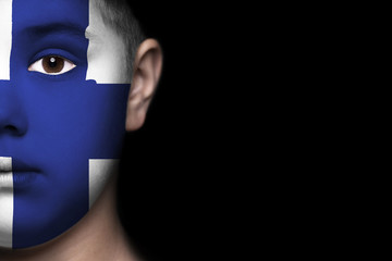 Human face painted with flag of Finland
